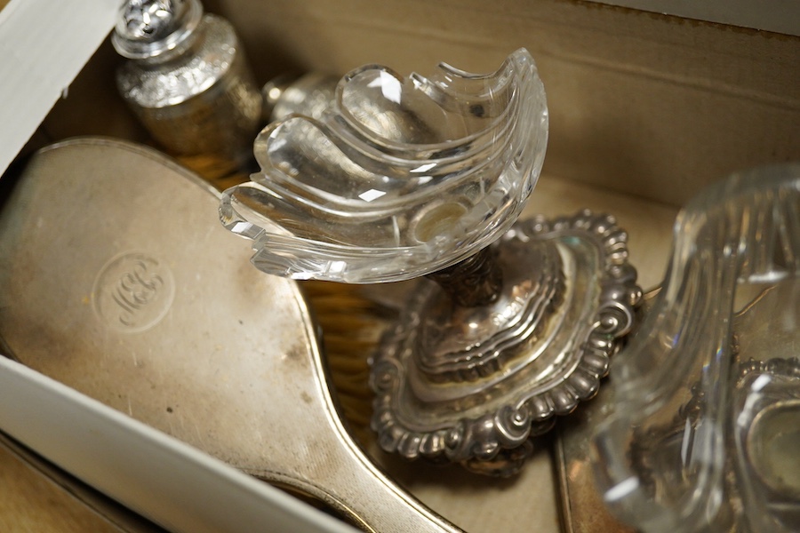 A pair of late 19th/early 20th century French white metal mounted pedestal glass salts, height 87mm, together with a pair of Victorian silver pedestal pepperettes, by Charles Stuart Harris, London, 1884, a silver mounted